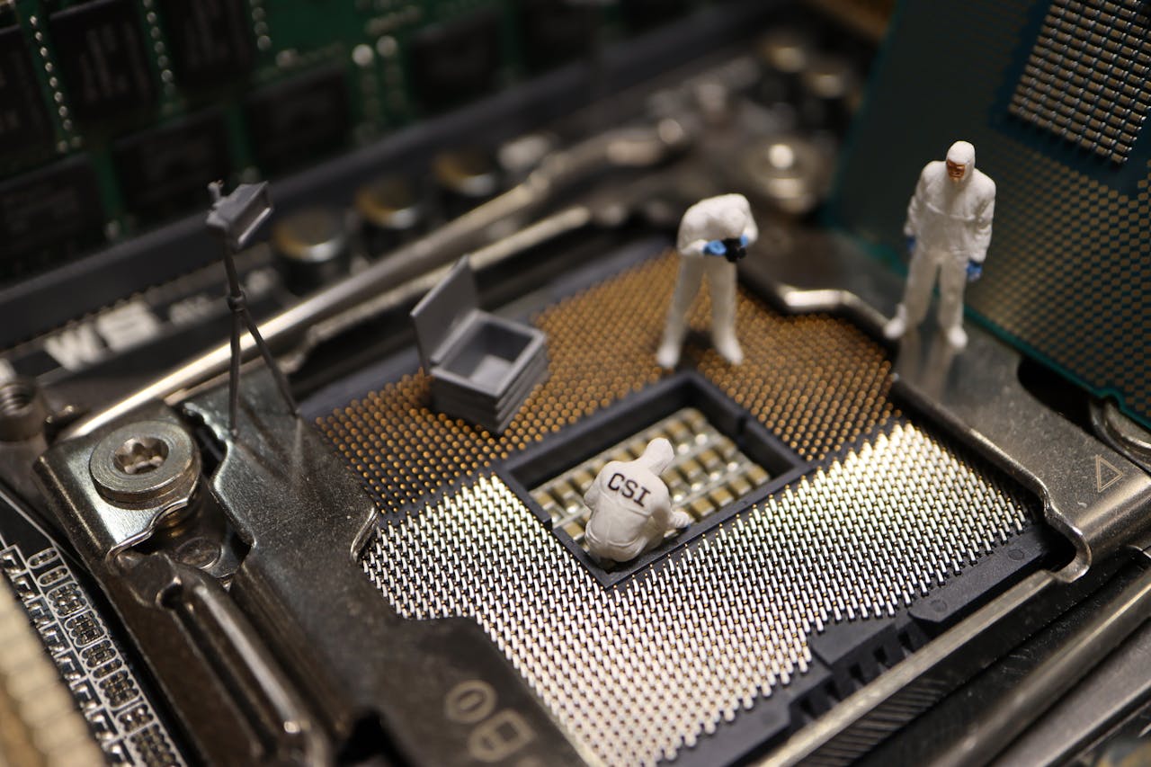 Tiny CSI figures conduct an investigation on a CPU, blending technology with creativity.